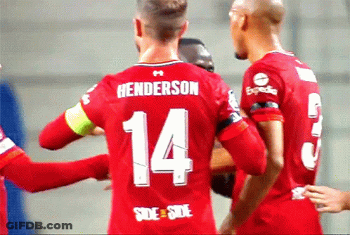 A Soccer Player Wearing A Red Jersey With The Number 14 On It GIF