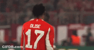 A Soccer Player Wearing A Red Jersey With The Number 17 On It GIF