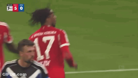 A Soccer Player Wearing A Red Jersey With The Number 17 On The Back GIF