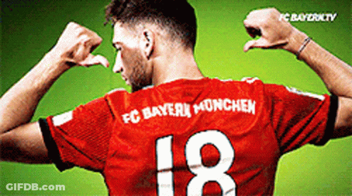 A Soccer Player Wearing A Red Jersey With The Number 18 On It GIF