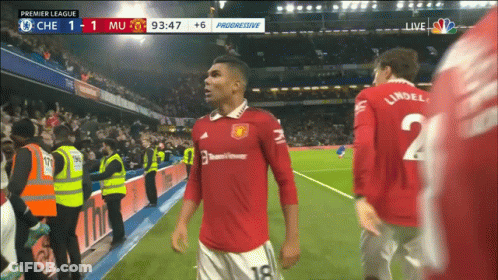 A Soccer Player Wearing A Red Jersey With The Number 18 On It GIF