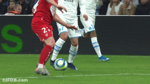 A Soccer Player Wearing A Red Jersey With The Number 2 On It GIF