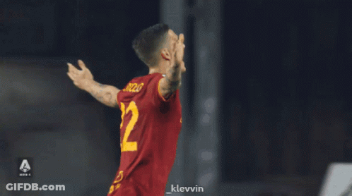 A Soccer Player Wearing A Red Jersey With The Number 22 On The Back GIF