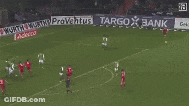 A Soccer Player Wearing A Red Jersey With The Number 23 On It GIF