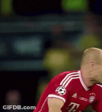 A Soccer Player Wearing A Red Jersey With The Number 4 On The Sleeve GIF