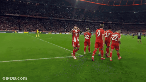 A Soccer Player Wearing A Red Jersey With The Number 42 On It GIF