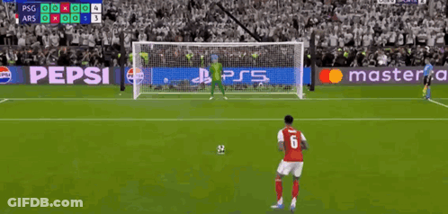 A Soccer Player Wearing A Red Jersey With The Number 6 On It Is About To Kick The Ball Into The Goal . GIF