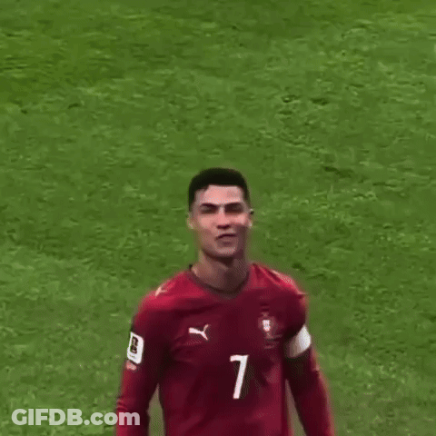 A Soccer Player Wearing A Red Jersey With The Number 7 On It Is Being Pointed At By A Person . GIF