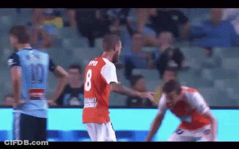 A Soccer Player Wearing A Red Jersey With The Number 8 On The Back GIF