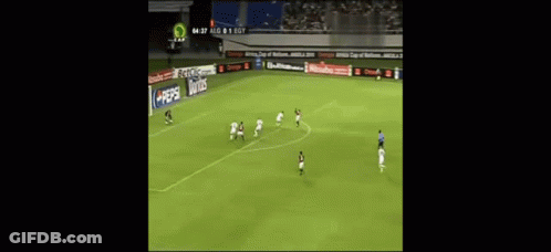 A Soccer Player Wearing A Red Jersey With The Number 9 On It GIF