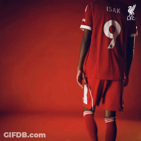 A Soccer Player Wearing A Red Jersey With The Number 9 On It GIF