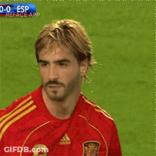 A Soccer Player Wearing A Red Jersey With The Number 9 GIF