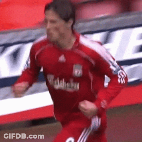 A Soccer Player Wearing A Red Jersey With The Word Carlsberg On It GIF