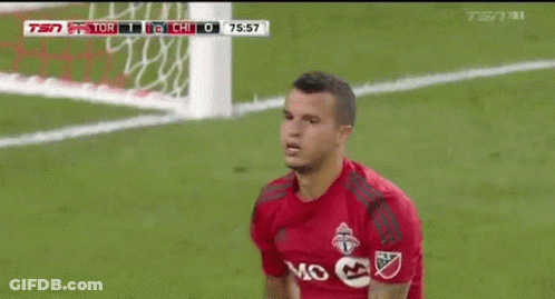 A Soccer Player Wearing A Red Jersey With The Word Mo On The Front GIF