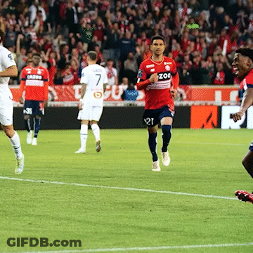 A Soccer Player Wearing A Red Jersey With Zoo On The Front GIF