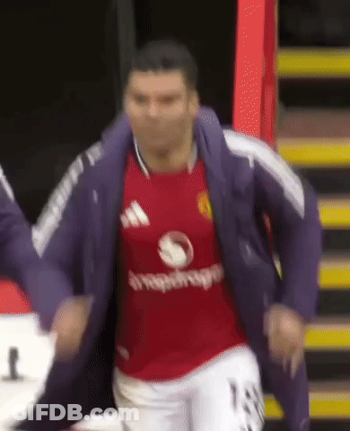 A Soccer Player Wearing A Red Shirt That Says ' Adidas ' On It GIF