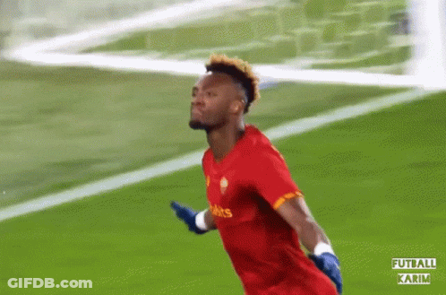 A Soccer Player Wearing A Red Shirt That Says ' Falcons ' On It GIF