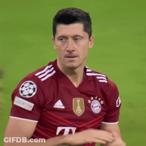 A Soccer Player Wearing A Red Shirt That Says Fifa GIF