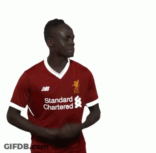 A Soccer Player Wearing A Red Shirt That Says New Balance On It GIF