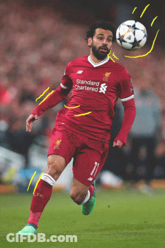 A Soccer Player Wearing A Red Shirt That Says Standard Chartered On It GIF