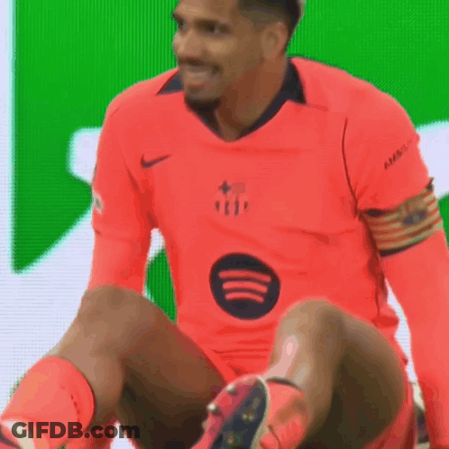 A Soccer Player Wearing A Red Shirt With A Spotify Logo On It GIF