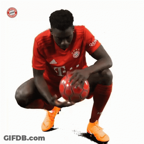 A Soccer Player Wearing A Red Shirt With The Letter T On The Front GIF