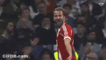 A Soccer Player Wearing A Red Shirt With The Number 13 On It GIF