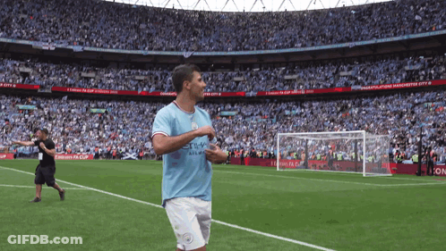 A Soccer Player Wearing A Shirt That Says Emirates Airlines GIF
