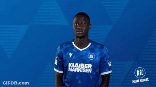 A Soccer Player Wearing A Shirt That Says Klarer Marksen GIF