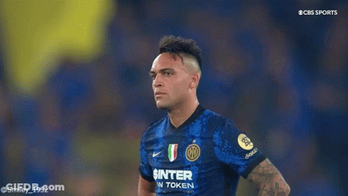 A Soccer Player Wearing A Shirt That Says ' Sinter Token ' On It GIF