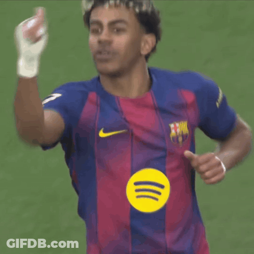 A Soccer Player Wearing A Shirt With A Spotify Logo On It GIF
