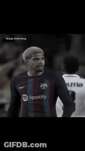 A Soccer Player Wearing A Spotify Shirt Salutes The Crowd GIF