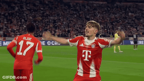 A Soccer Player Wearing A T-Mobile Jersey Celebrates A Goal GIF