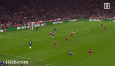 A Soccer Player Wearing A T-Mobile Jersey Stands On A Field GIF