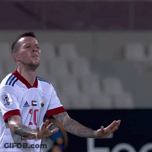 A Soccer Player Wearing A White Adidas Jersey GIF