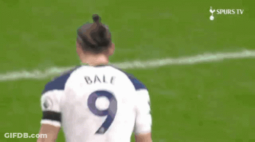 A Soccer Player Wearing A White Aia Jersey Celebrates GIF