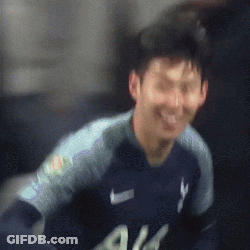 A Soccer Player Wearing A White All Jersey Kicks A Ball GIF