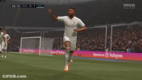 A Soccer Player Wearing A White Emirates Jersey Runs On The Field GIF