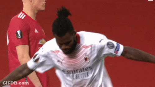 A Soccer Player Wearing A White Emirates Shirt GIF