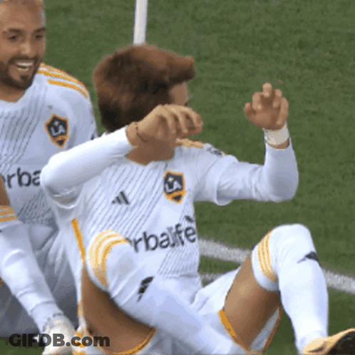 A Soccer Player Wearing A White Herbalife Jersey GIF