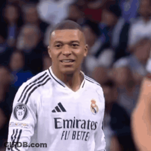 A Soccer Player Wearing A White Jersey With Emirates Fly Better On It GIF