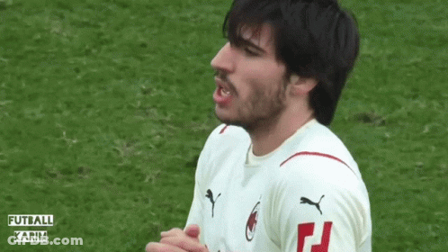 A Soccer Player Wearing A White Jersey With The Letter F On The Sleeve GIF