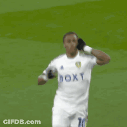 A Soccer Player Wearing A White Jersey With The Number 10 On The Back GIF