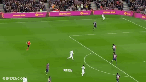 A Soccer Player Wearing A White Jersey With The Number 22 On It GIF