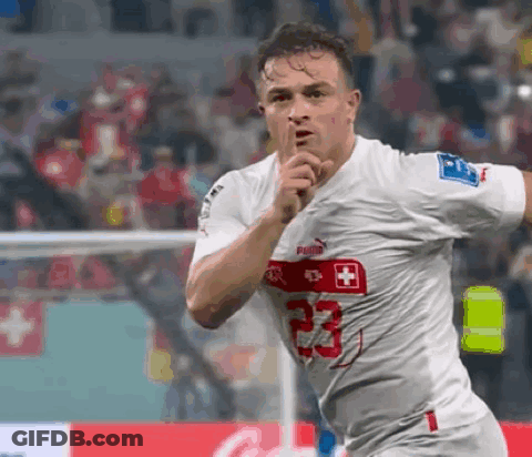 A Soccer Player Wearing A White Jersey With The Number 23 GIF