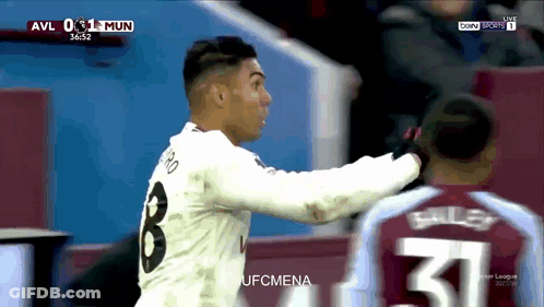 A Soccer Player Wearing A White Jersey With The Number 3 On It GIF