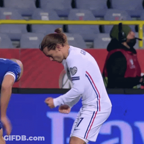A Soccer Player Wearing A White Jersey With The Number 7 On It GIF