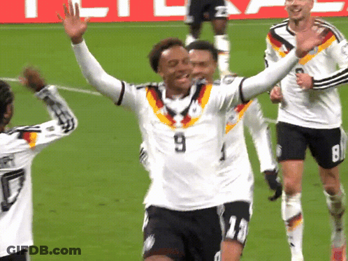 A Soccer Player Wearing A White Jersey With The Number 9 On The Front GIF