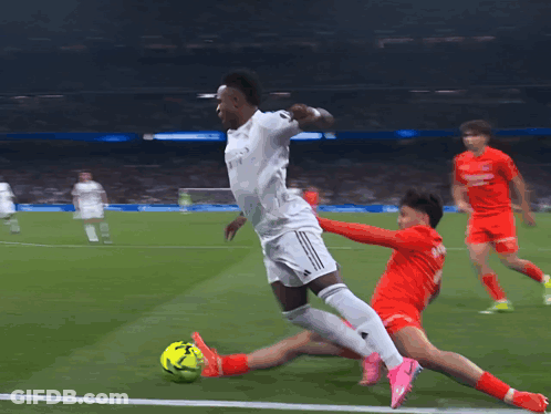 A Soccer Player Wearing A White Jersey With The Word Adidas On The Front GIF