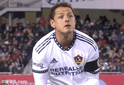 A Soccer Player Wearing A White Jersey With The Word Herbalife On It GIF